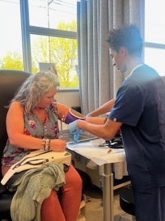 Andrea Laurs, MA with The Oregon Clinic Orthopedic Specialists with Benson High School MA Students