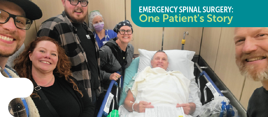 Photo showing a patient surrounded by family going into surgery with Dr. Deshmukh